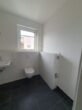 Exklusive 3 - Zimmer Neubauwohnung inkl. Einbauküche im Herzen von Bensheim - Badezimmer mit Waschmaschinenanschluss