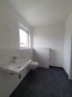 Exklusive 3 - Zimmer Neubauwohnung inkl. Einbauküche im Herzen von Bensheim - Badezimmer mit Waschmaschinenanschluss