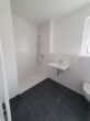Exklusive 3 - Zimmer Neubauwohnung inkl. Einbauküche im Herzen von Bensheim - Badezimmer mit Dusche