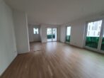 Exklusive 3 - Zimmer Neubauwohnung inkl. Einbauküche im Herzen von Bensheim - Wohn, Ess - und Küchenbereich