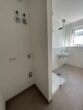 Exklusive 3 - Zimmer Neubauwohnung inkl. Einbauküche im Herzen von Bensheim - Waschmaschinenanschluss im Badezimmer