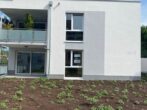 ERSTBEZUG: Exklusive und hochwertige 3 - Zimmerwohnung mit eigenem Gartenanteil im Herzen von Weinheim - Außenansicht zur Terasse
